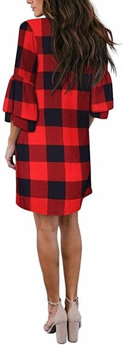 A model wearing a Buffalo plaid print dress with bell sleeves