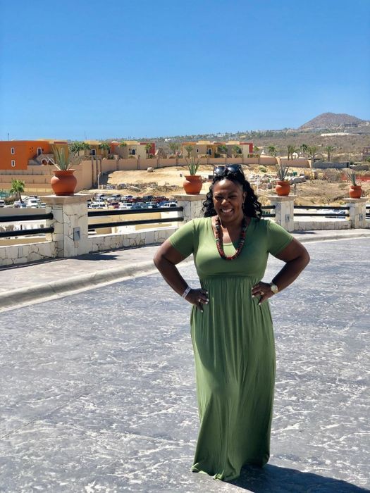 customer image of a reviewer wearing the army green DEARCASE short sleeve maxi dress outside