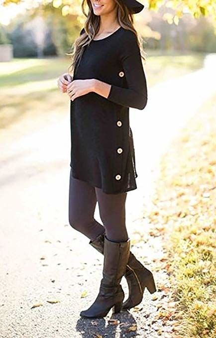 A model wearing a tunic with side buttons, styled with tights and knee-high boots