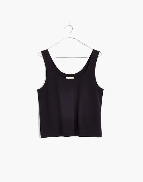 A product image of the tank top hanging on a hanger.