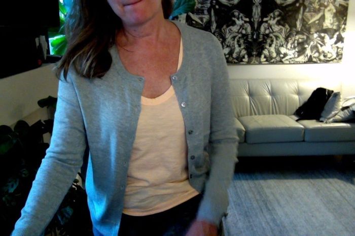 A reviewer sporting the sweater.