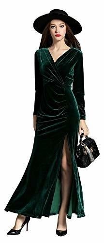 A model wearing a green velvet maxi dress with a V-neck and a high slit on one side