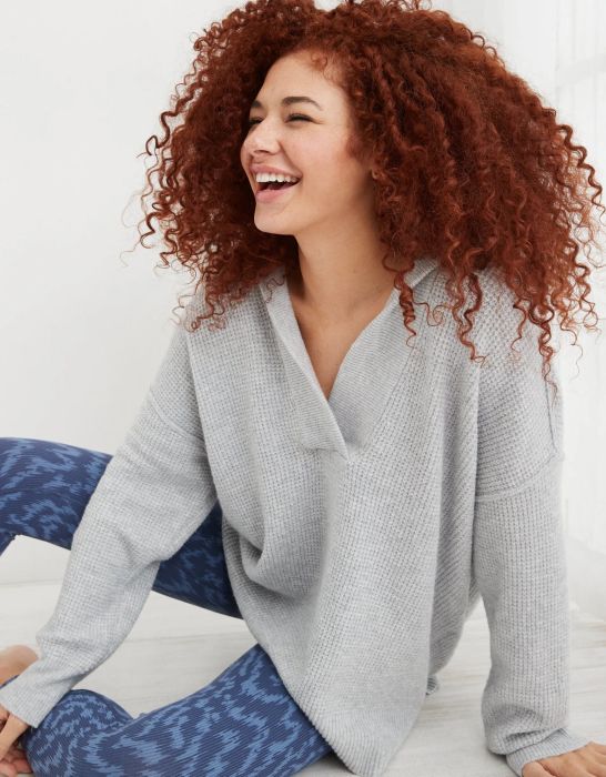 model wearing the grey waffle deep-V long sleeve hoodie