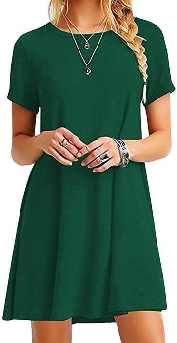 a model wearing the dark green T-shirt dress