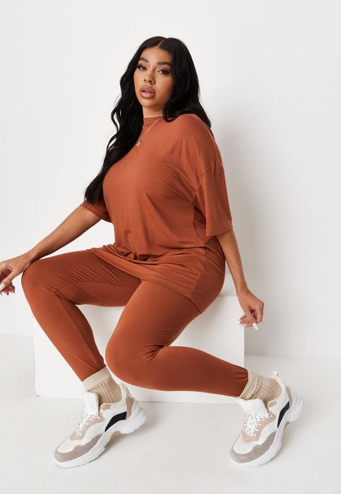 leggings paired with an oversized tee