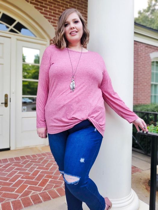 long-sleeve top with a tied front hem