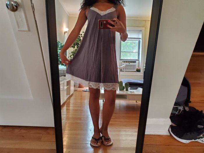 customer image of a reviewer snapping a mirror selfie in the grey Ekouaer chemise lace slip
