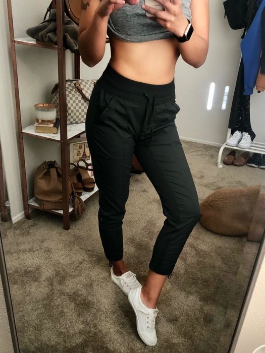 reviewer image of a customer capturing a mirror selfie in the black CRZ YOGA Women's Studio Capri Joggers