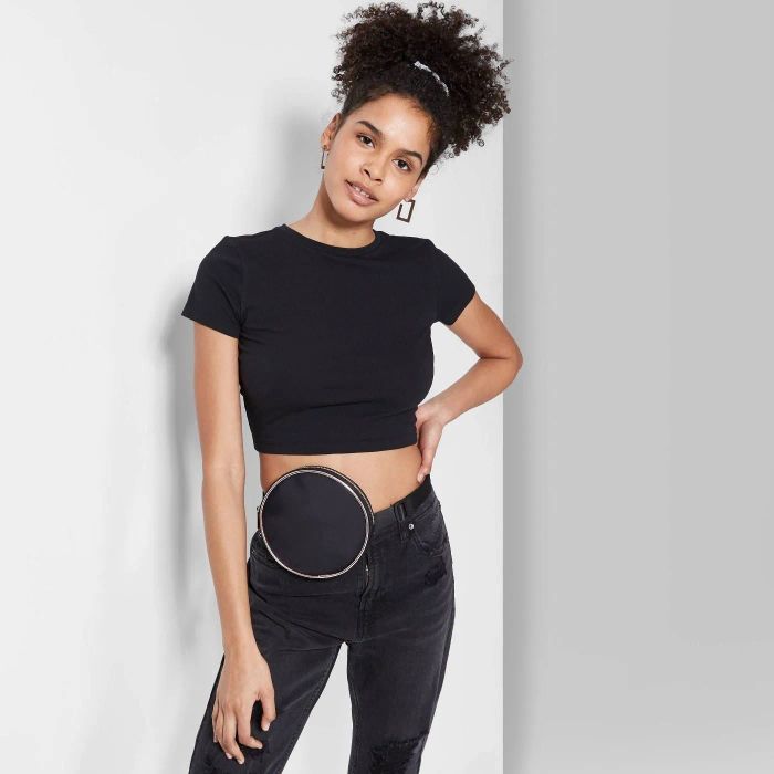 Model showcasing a black crop top