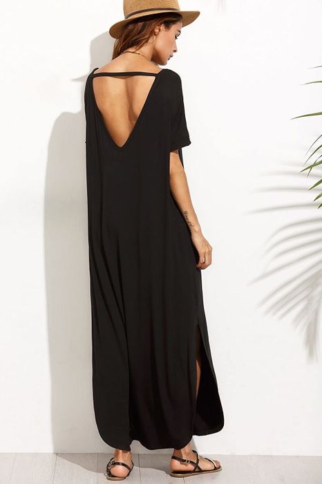 a model showcasing the dress, highlighting the open triangle back design with a shoulder strap