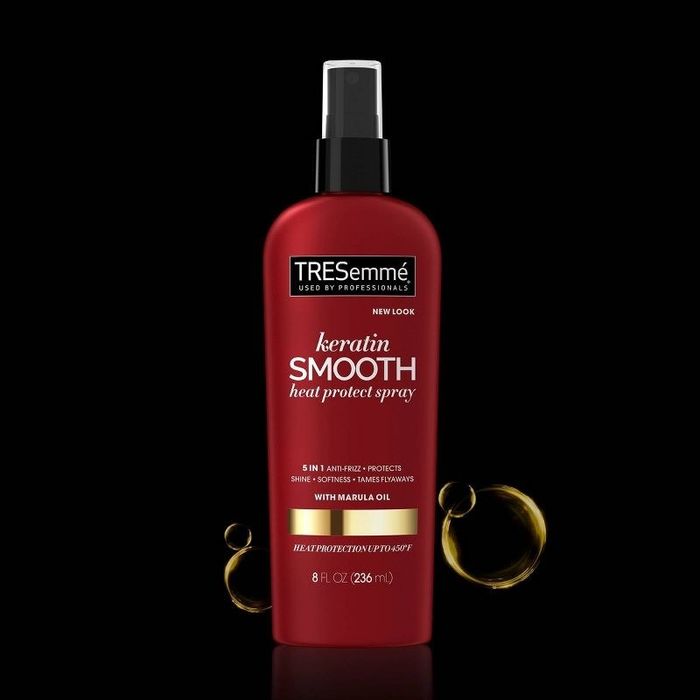 A bottle of heat protectant spray