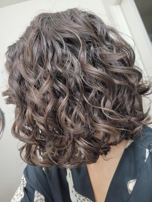 Photo of the reviewer's hair styled with the Bounce Curl brush
