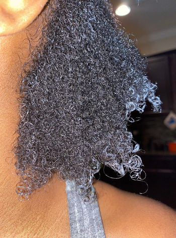 The reviewer’s hair after using the detangling brush.