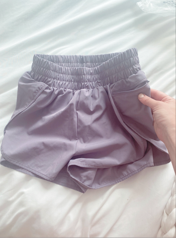 The shorts are shown with the editor highlighting a small zippered side pocket.