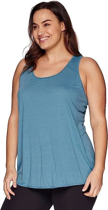 A model wearing the blue top paired with black bottoms