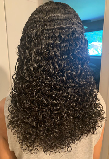 The reviewer's hair after detangling their curls.