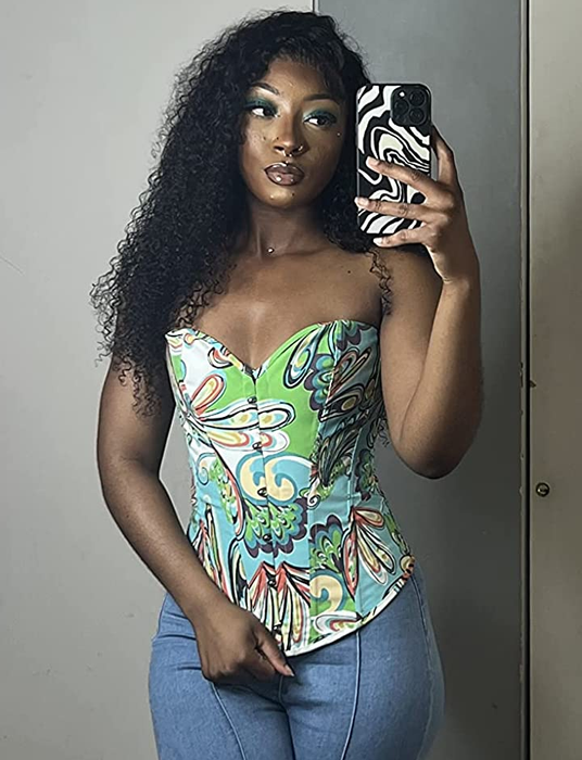 Photo of reviewer modeling a green corset
