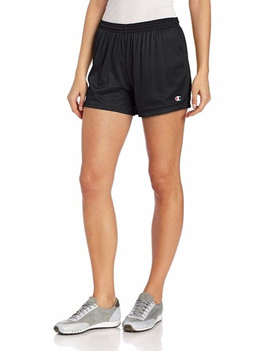 A model is seen wearing upper-thigh-length mesh shorts in black.