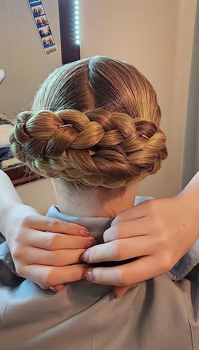 A reviewer’s braided bun secured with the pins