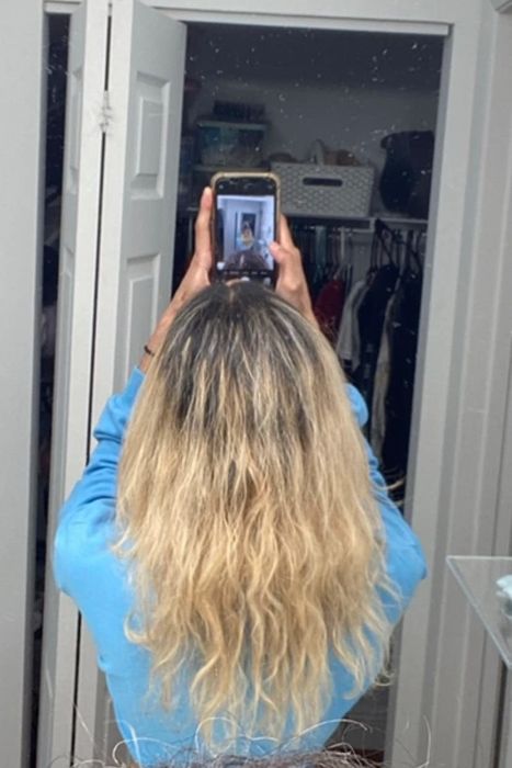 A reviewer's hair before applying the mask