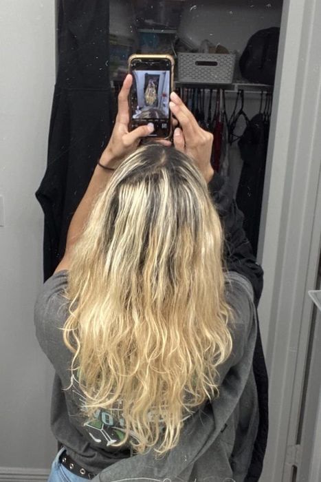 A reviewer's hair after applying the mask