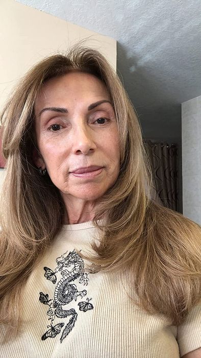A reviewer with perfectly blown-out hair