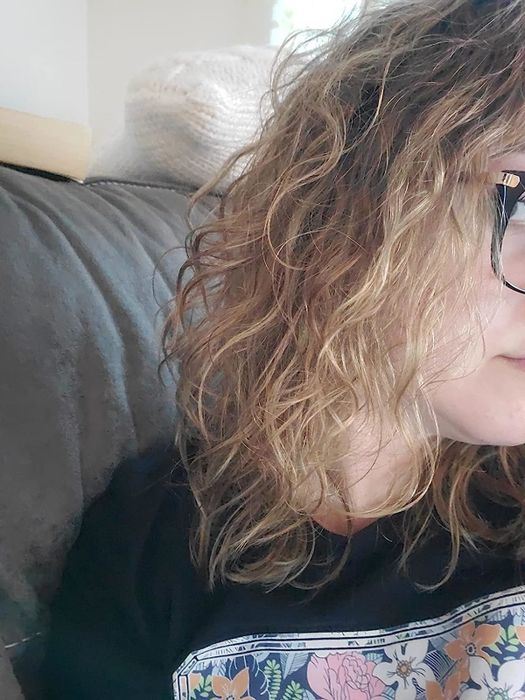 A photo of a reviewer's hair after applying the wave spray
