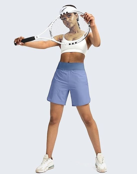 model showcasing the blue shorts