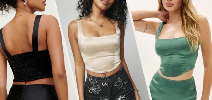 Photo of three models wearing black, ivory, and green tops