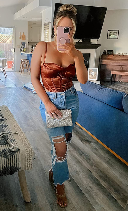 Photo of reviewer showcasing a brown top