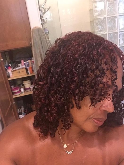 The reviewer's curls after styling with the brush