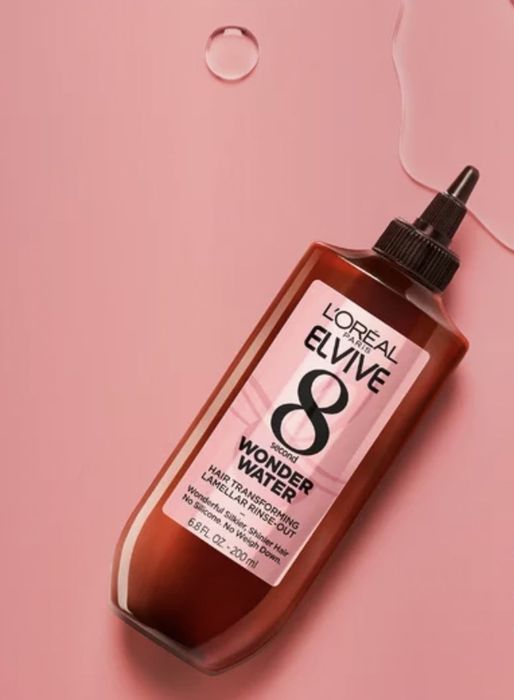 A bottle of hair treatment product