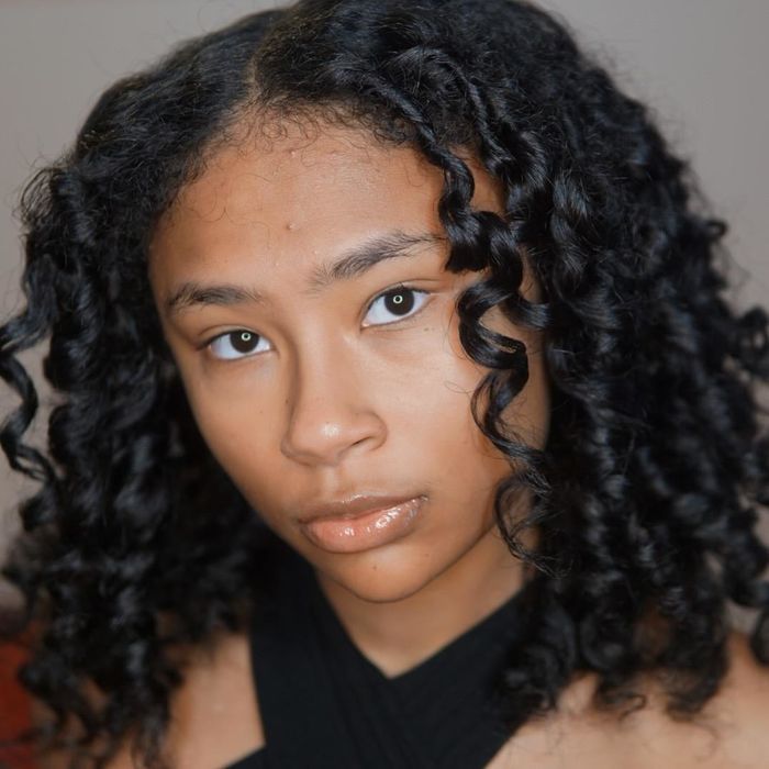 The same reviewer showcasing their beautifully defined curls the following day