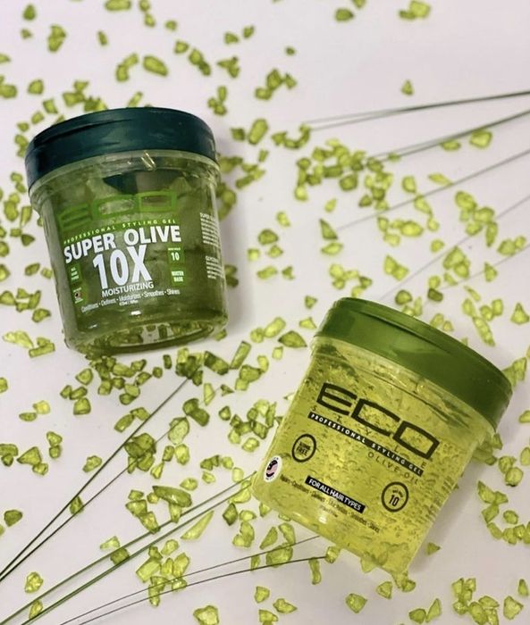 A pair of large hair gel jars