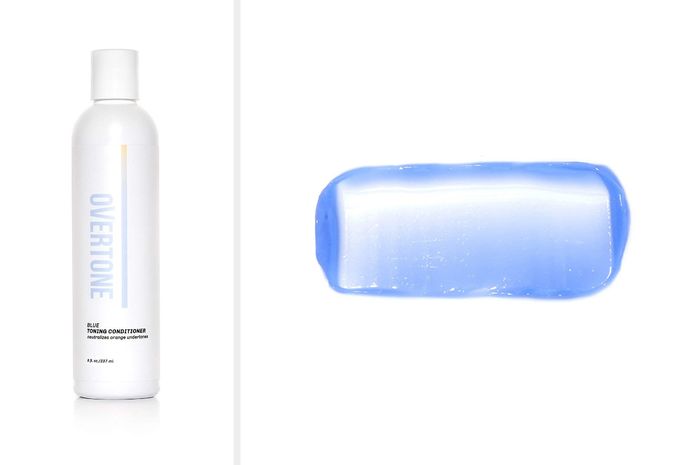 A white and blue bottle of hair toning conditioner labeled