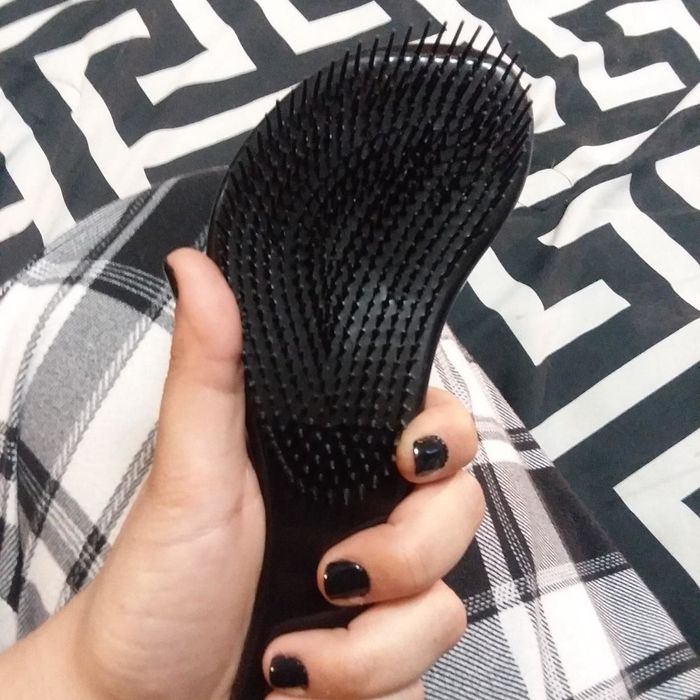 the brush in a sleek black design
