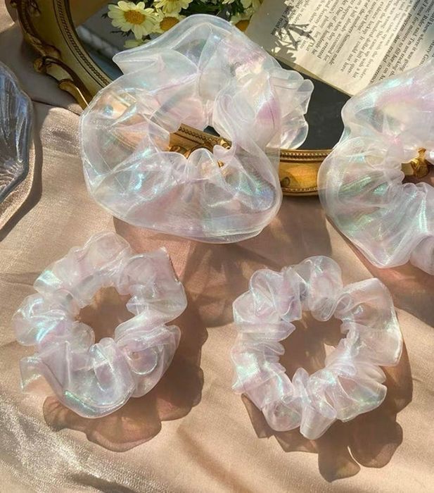 the iridescent scrunchies available in small and large sizes