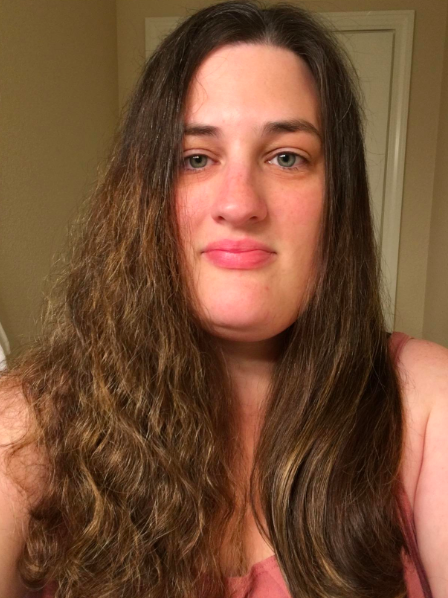 A reviewer showcasing a split comparison: one side with natural waves (before) and the other side smooth and blown out (after using the tool)