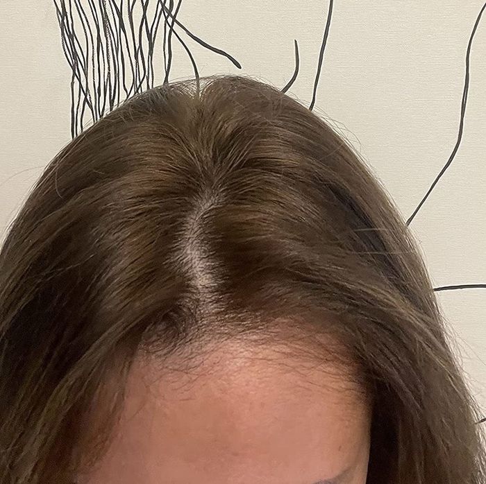 An after photo of the same reviewer’s hair looking refreshed and less weighed down