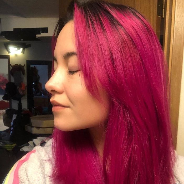 An after photo of the same reviewer showcasing their hair looking significantly more hydrated after using the mask