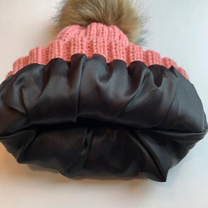The satin lining inside the hat
