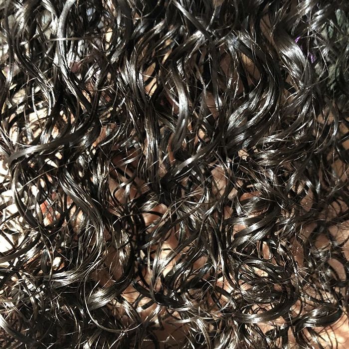 A photo of the reviewer’s wet 3B type hair after being brushed