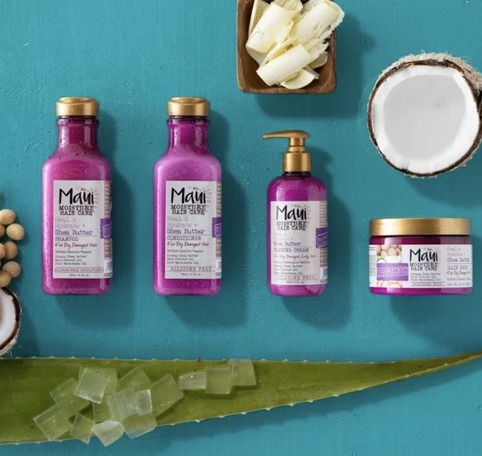 A collection of shampoo, conditioner, hair mask, and detangler