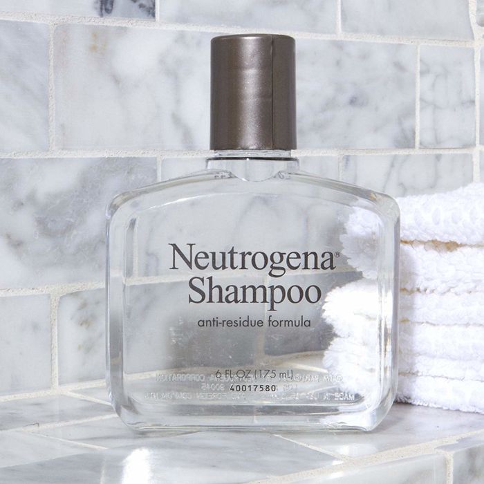 The transparent shampoo bottle