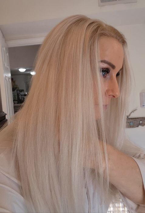 reviewer's hair after applying the spray