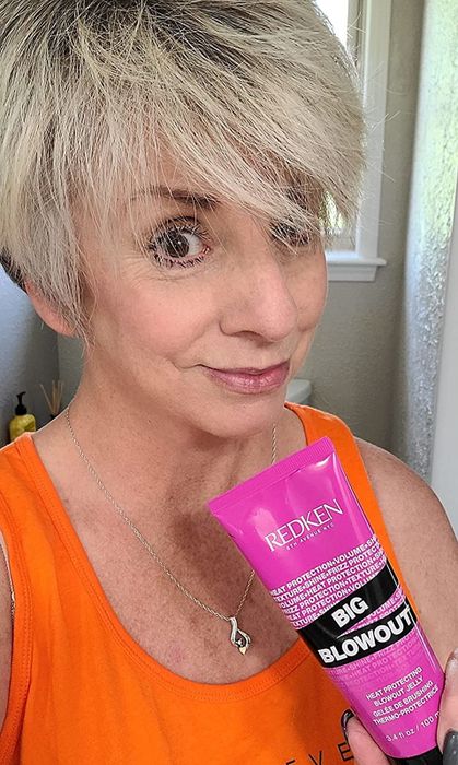 reviewer showcasing their hair along with the blow-drying gel