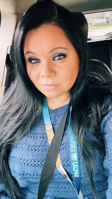 Reviewer showcasing glossy hair after using the serum.
