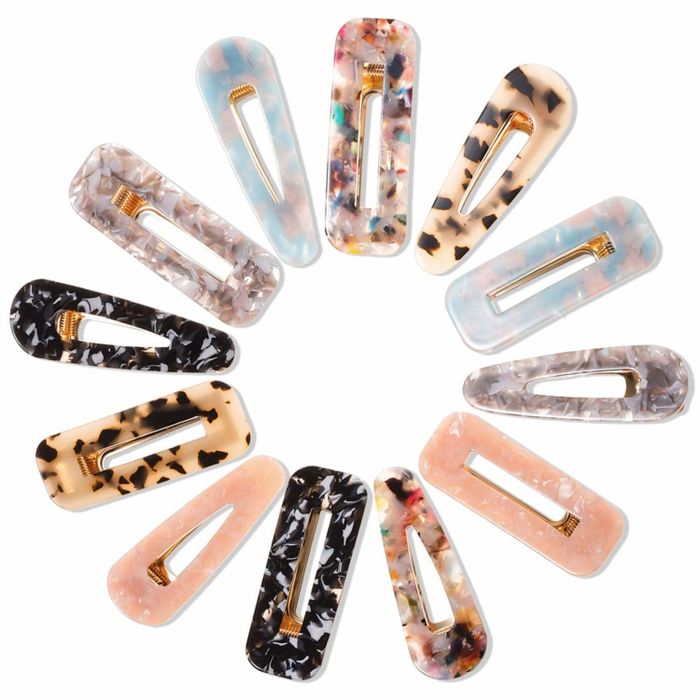 The 12 barrettes arranged in a circular pattern