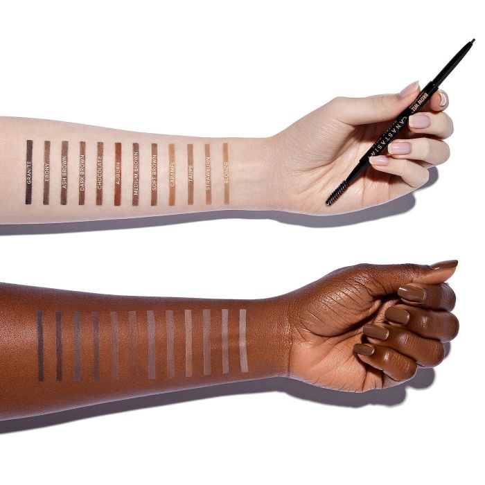 two models’ arms displaying swatches of the brow pencil in various shades