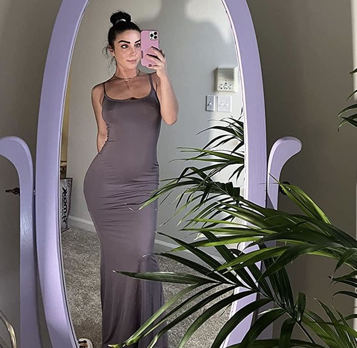 reviewer modeling the dress